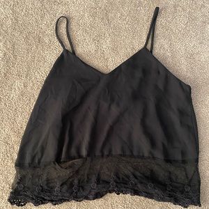 medium black flow tank top! slightly used :)